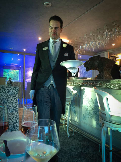 Dinner in the Leopard Bar on Uniworld's S.S. Maria Theresa. © 2015 Ralph Grizzle