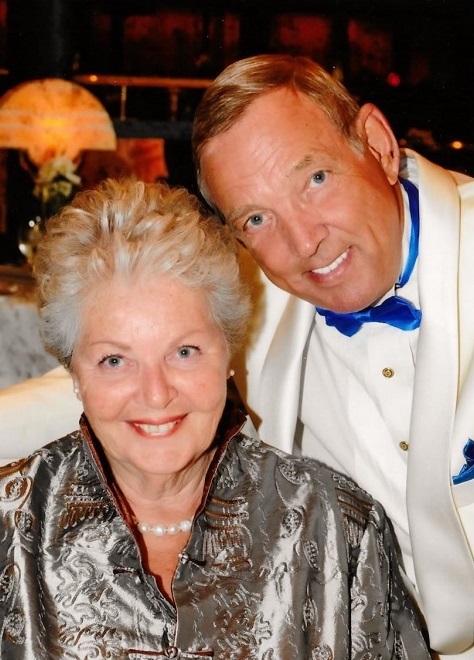 smiling dressed up couple