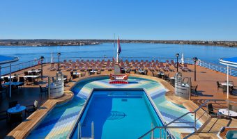 pool on board ship with ocean in background